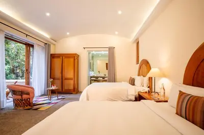 Cama o camas de una habitación en Mision del Sol Resort & Spa Adults Only
