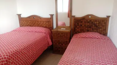 Cama o camas de una habitación en La Sirenita