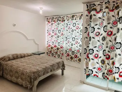 Cama o camas de una habitación en La Sirenita