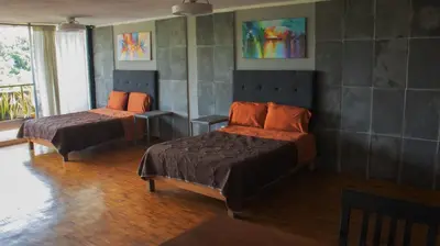 Cama o camas de una habitación en Suites Las Plazas