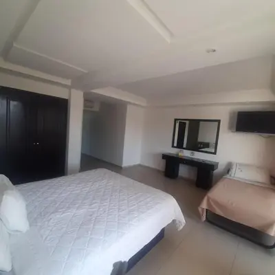 Cama o camas de una habitación en Hotel Borda Cuernavaca