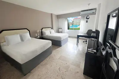 Cama o camas de una habitación en Days Inn by Wyndham Tuxtepec