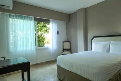 Cama o camas de una habitación en Days Inn by Wyndham Tuxtepec