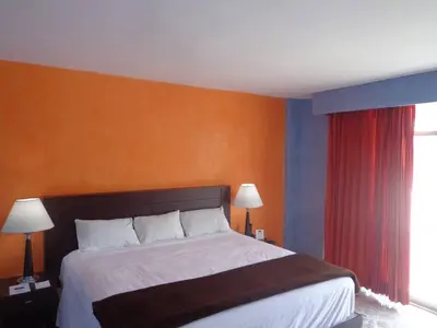 Cama o camas de una habitación en Hotel María Eugenia Tuxtla Gutiérrez