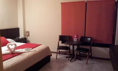 Cama o camas de una habitación en Hotel Real del Sol