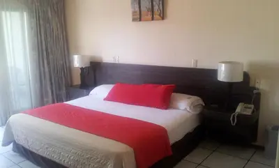 Cama o camas de una habitación en Hotel Real del Sol
