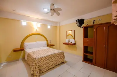 Cama o camas de una habitación en Hotel Central Puebla