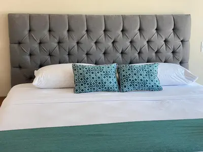 Cama o camas de una habitación en FRENTE PLAYA vista al mar, PISCINA DE USO EXCLUSIVO
