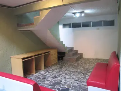 Zona de estar de Guest Green