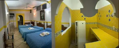 Cama o camas de una habitación en Hotel Real Jojutla