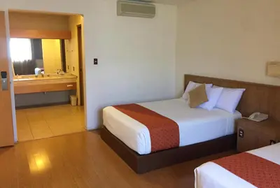 Cama o camas de una habitación en Hotel Villablanca