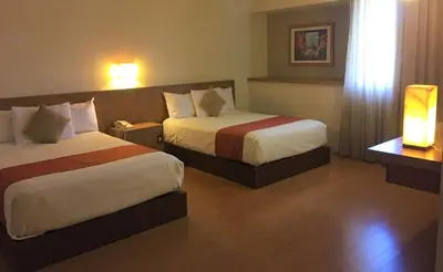 Cama o camas de una habitación en Hotel Villablanca