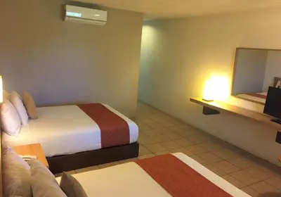 Cama o camas de una habitación en Hotel Villablanca