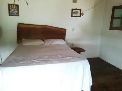 Cama o camas de una habitación en Cabañas La Isla Chacahua
