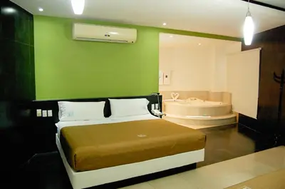 Cama o camas de una habitación en Hotel Porto Novo