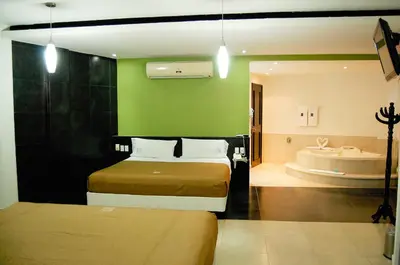 Cama o camas de una habitación en Hotel Porto Novo