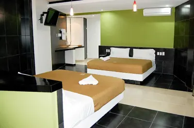 Cama o camas de una habitación en Hotel Porto Novo
