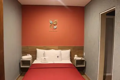 Cama o camas de una habitación en Hotel Teresita