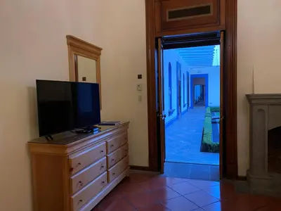 Una televisión o centro de entretenimiento en Estrella de Belem B&B and Spa