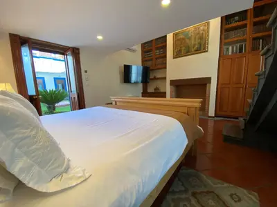 Una televisión o centro de entretenimiento en Estrella de Belem B&B and Spa