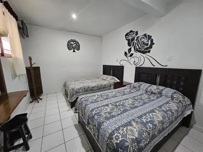 Cama o camas de una habitación en Hotel posada Juquila