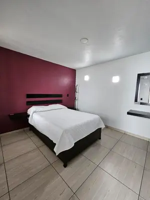 Cama o camas de una habitación en Hotel posada Juquila