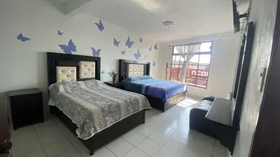Cama o camas de una habitación en Hotel posada Juquila