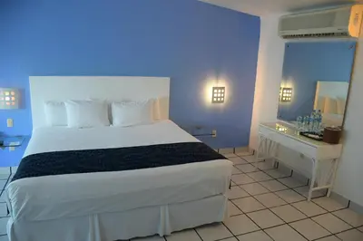 Cama o camas de una habitación en Villa Bejar Tequesquitengo