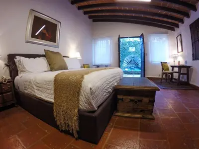 Cama o camas de una habitación en Hotel Boutique Casa de Campo