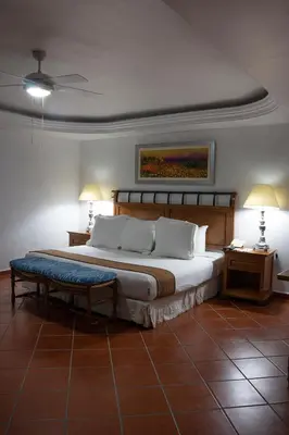 Cama o camas de una habitación en Hotel Boutique Casa de Campo