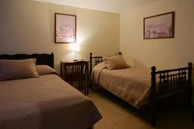Cama o camas de una habitación en Posada Galeria Alberto Sedas