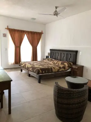Cama o camas de una habitación en Hotel SKY & PALMS
