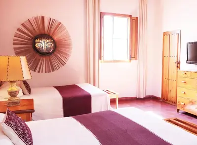 Cama o camas de una habitación en Hotel los Arcos
