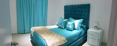 Cama o camas de una habitación en Departamento Privado 3 recamaras