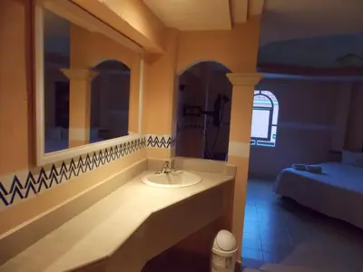 Cama o camas de una habitación en Hotel Express Alejandría