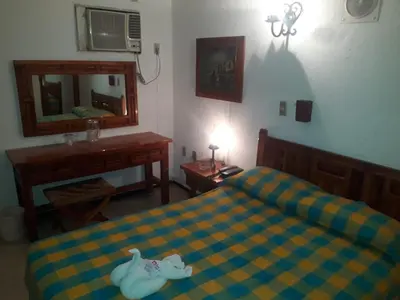 Cama o camas de una habitación en Hotel Maria Luisa
