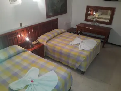 Cama o camas de una habitación en Hotel Maria Luisa