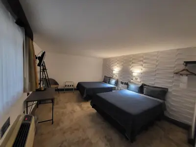 Cama o camas de una habitación en Hotel Palmareca