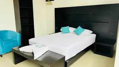 Cama o camas de una habitación en Hotel Villa Pralaya