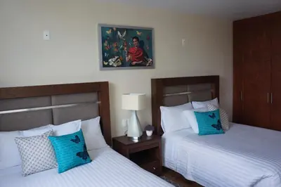 Cama o camas de una habitación en Hotel Mirante Tlaxcala