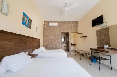 Cama o camas de una habitación en Hotel Gran Juquila Huatulco