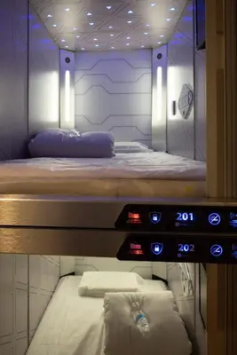 Cama o camas de una habitación en izZzleep Aeropuerto Terminal 2