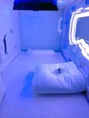 Cama o camas de una habitación en izZzleep Aeropuerto Terminal 2