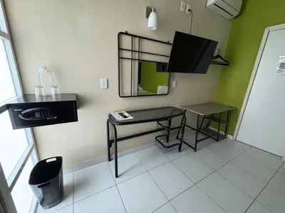 Una televisión o centro de entretenimiento en Casa Mia