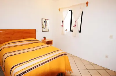 Cama o camas de una habitación en Casa Gecko