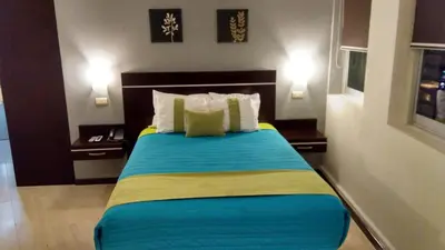Cama o camas de una habitación en Hotel Misión Express Xalapa