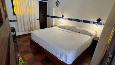 Cama o camas de una habitación en Hotel Paraiso Escondido