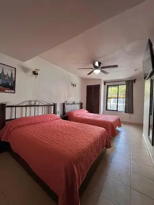 Cama o camas de una habitación en Hotel Uke Inn Terán