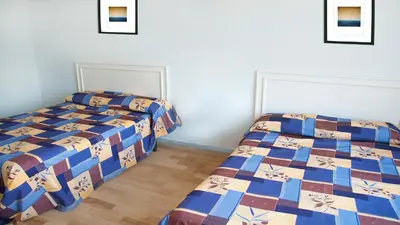 Cama o camas de una habitación en Dorados Acapulco