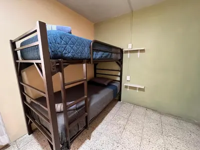Cama o camas de una habitación en Hostal Central Oaxaca